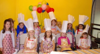 All of the little bakers, looking official