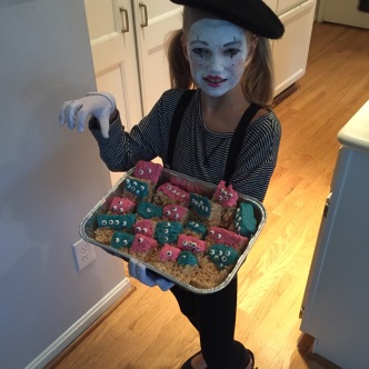 Adele as mime with Halloween treats