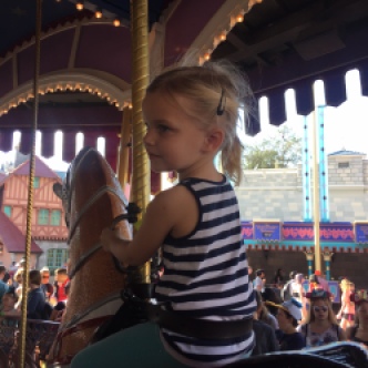 Camile on the carousel